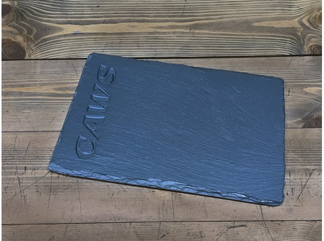 Welsh slate rectangle cheeseboard with the words Eat Drink and Be Merry